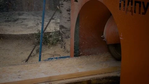 Wood cutting machine board log in a sawmill. slow motion Stock Footage 81328386