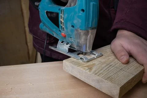 Wood cutting machine in carpentry workshop Stock Photos