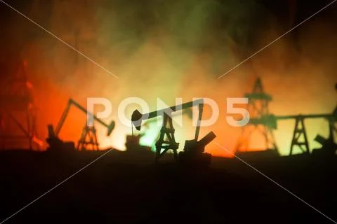 Wood Decoration. Oil pump oil rig energy industrial machine for petroleum in Stock Photos