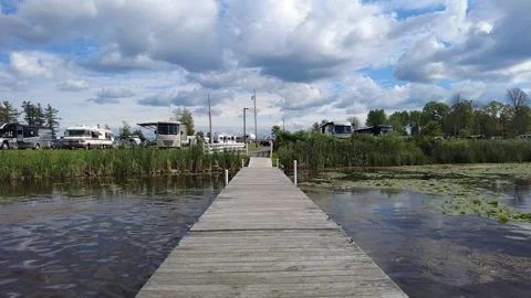 Wood dock by a campground Stock Footage 157559384