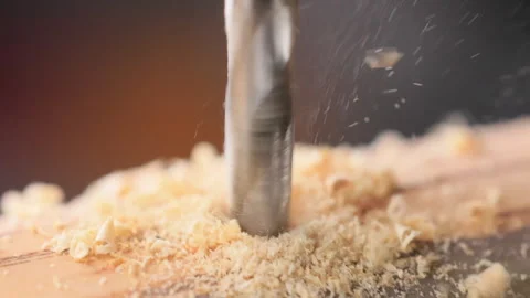 Wood drill bit in the process of drilling Stock Footage 276555707