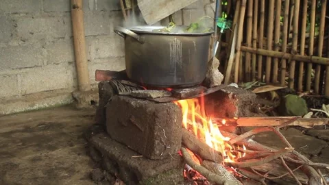 Wood fire stove in a rustic kitchen Video stock 276804659