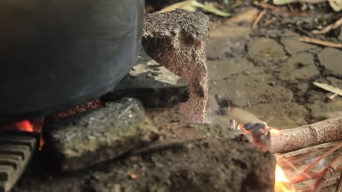 Wood fire stove in a rustic kitchen Video stock 276951586
