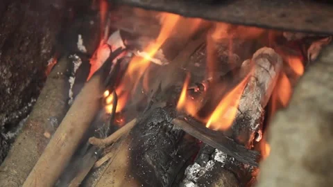 Wood fire stove in a rustic kitchen Video stock 277250402
