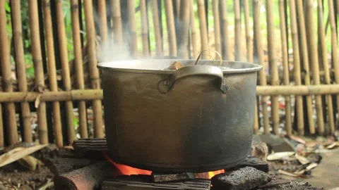 Wood fire stove in a rustic kitchen Video stock 277624538
