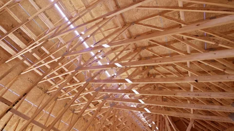 Wood framing beams support structure for new building under construction Stock Footage 342743378