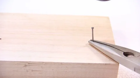 Wood hammer nail Stock Footage 84138653