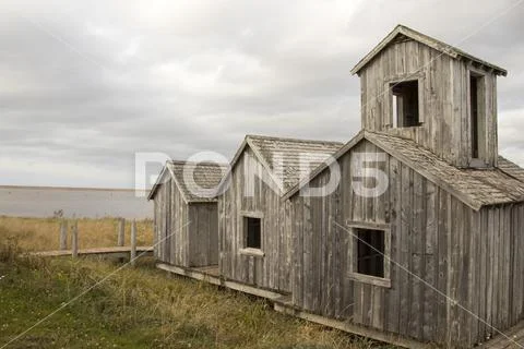 Wood Islands Provencial Park wooden fishing huts on coast Stock Photos