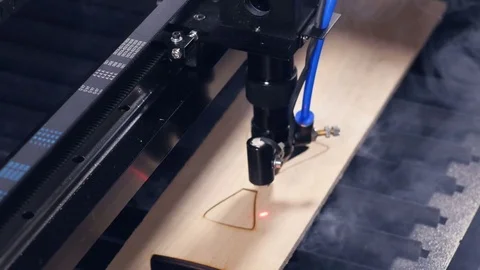 Wood laser cutting machine working. 4K. Stock Footage 78603931
