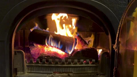 Wood Logs Burning with Bright Orange Flames in Indoor Fireplace Stock Footage 340245111