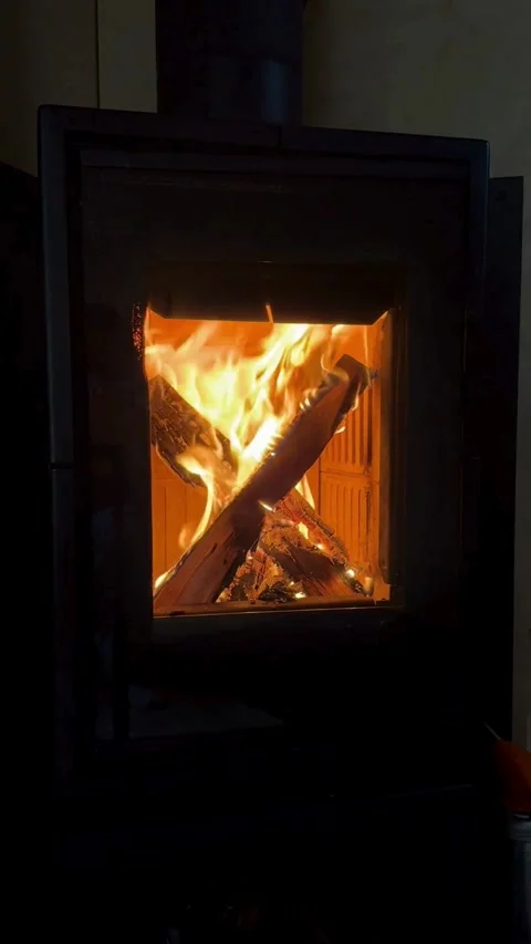 Wood logs burning inside a fireplace with bright flames Stock Footage 331774971