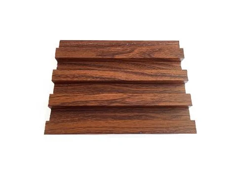 Wood-patterned PVC fluted wall panel sample Fotos de archivo