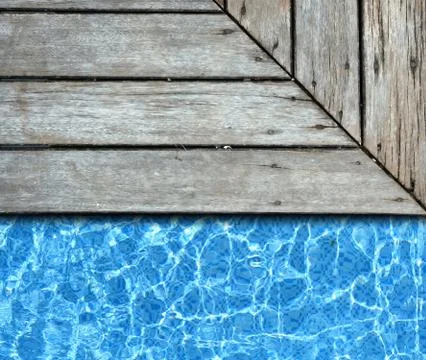 Wood pavement with pool background Stock Photos