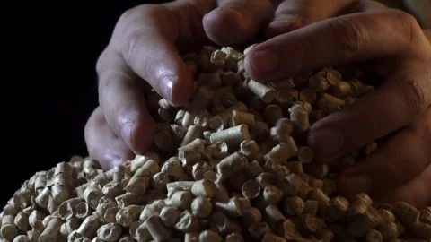 Wood Pellets Alternative Heat Source biomass, renewable and sustainable ene.. Stock Footage 272786839