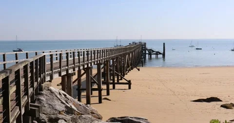 Wood pier on the beach Stock Footage 286229574