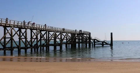 Wood pier on the beach Stock Footage 288012141