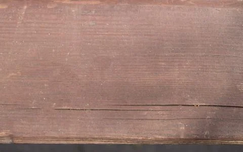 Wood plank brown texture background lit by sunlight Stock Photos