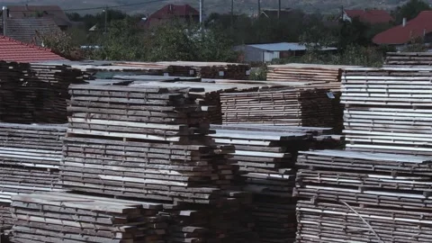 Wood Planks Stack in Pile Top of each Other at Sawmill Stock Footage 142137934