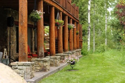 Wood posts by grass Foto stock