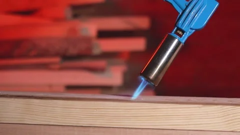 Wood processing with fire Stock Footage 187010356