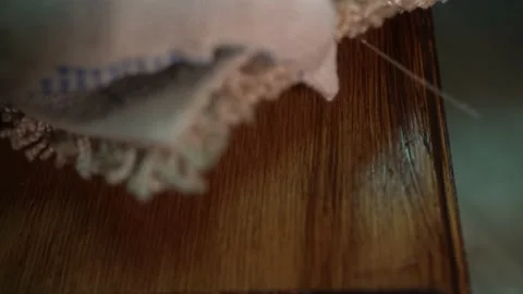 Wood processing, man prepares wooden part for furniture, cleans and polishes it Stock Footage 149122434