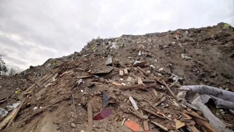 Wood processing. Recycling. Ecology. Large mountains of bulk wood biomass. Stock-Footage 335689630