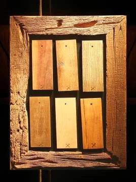 Wood sample rectangle swatches inside wooden frame 스톡 사진