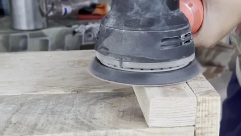 Wood Sanding Process in Workshop with Handheld Camera Stock Footage 337422888
