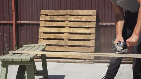 Wood sanding with a sander Stock Footage 314310476