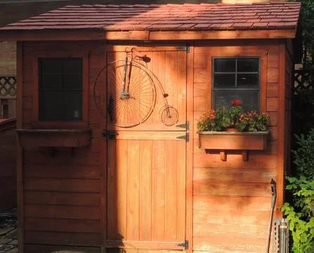 Wood Shed and Bicycle  Stock Photos