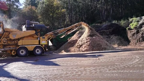 Wood shredding machine processing waste wood in slow motion Stock-Footage 313917943