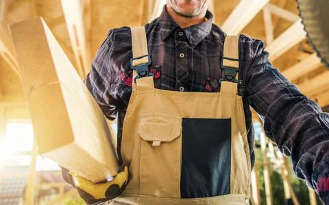 Wood Skeleton Framing Construction Worker with Plank Stock Photos