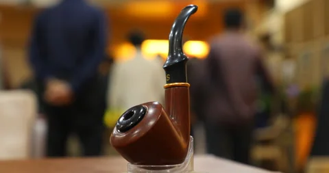 Wood Smoking Pipe on a table Stock Footage 288634369