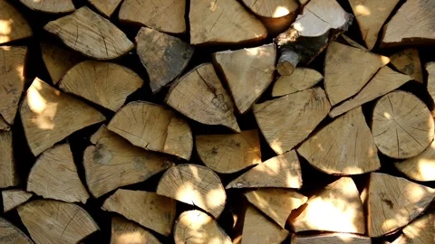 Wood stacking and organization for firewood storage in a home setting Stock Footage 344878491