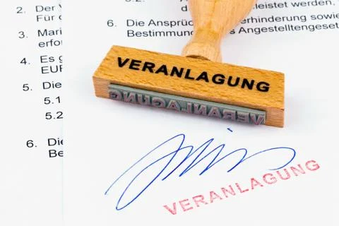 Wood stamp on the document: assessment Foto stock
