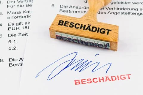 Wood stamp on the document: damaged Stock Photos