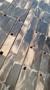 Wood surface. Abstract background. End slice of wooden slats Stock Photos