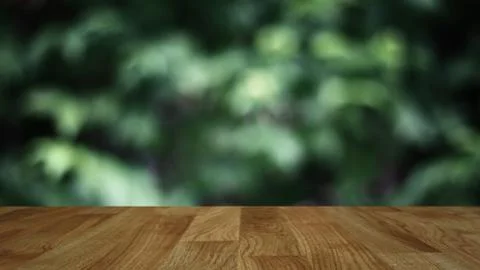 Wood table background with abstract blurred soft light fresh green nature bac Foto stock