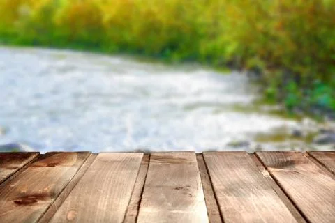 Wood table with river Fotos Stock