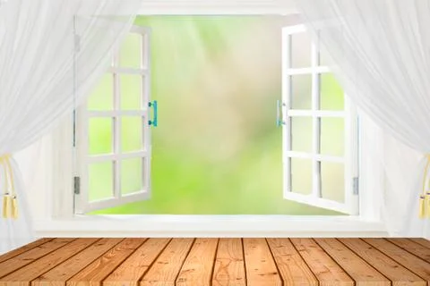 Wood table top on window spring background - can be used for display or monta Stock Photos