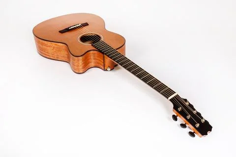 Wood texture of lower deck of six strings acoustic guitar on white backgrou.. Stock Photos