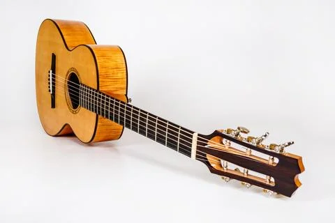 Wood texture of lower deck of six strings acoustic guitar on white backgrou.. Stock Photos