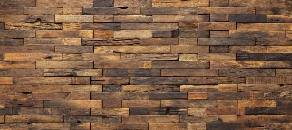 Wood texture wall panel made of small planks. brown planks as background Stock Photos