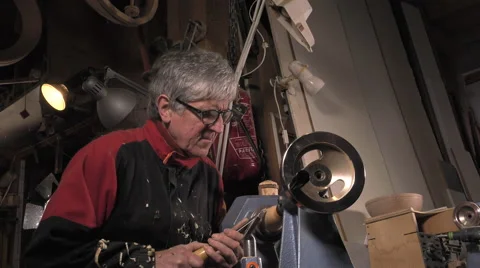 Wood turner cutting shapes in wood Stock-Footage 59369186