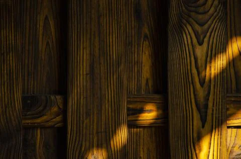 Wood wall plank texture background with light and shadow in the morning day Stock Photos