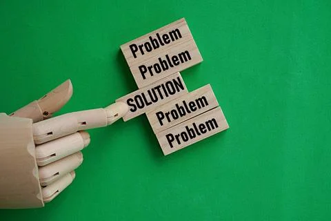 Woodblock printed PROBLEM. Hand holding SOLUTION printed block. Job concept 스톡 사진