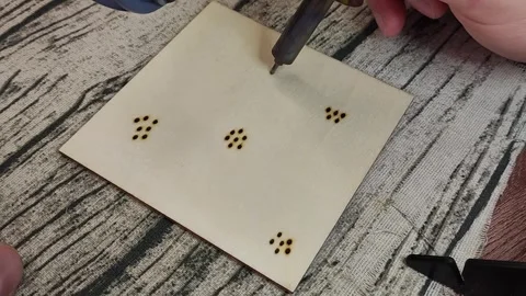 Woodburning ASMR dots spots second Stock Footage 244486041