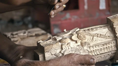 Woodcarver Making Carving with Sharp Tools on Wooden Workpiece. Traditional Bali Stock Footage 294658816