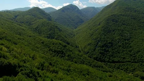 A wooded mountain on the tree-lined Apennines. Aerial Stock Footage 72216686