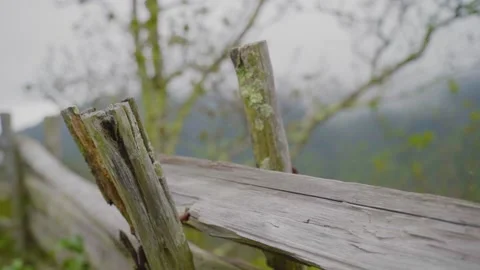 Wooded Post with Clouds in mountains rack focus Stock Footage 152535908